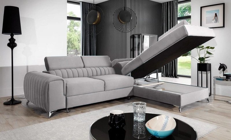 Light grey Fairhaven corner sofa bed with the chaise storage lid lifted to show the storage box