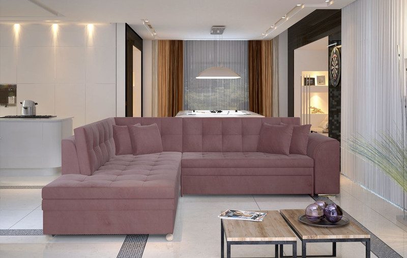 Dusky pink Everleigh corner sofa bed with tufted seats, matching scatter cushions and a deep chaise on the left, in an open-plan room with two wooden side tables
