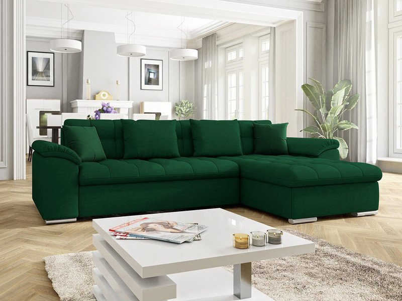Emerald green Goldcrest K19 corner sofa bed with storage in a large, light living room with a white coffee table