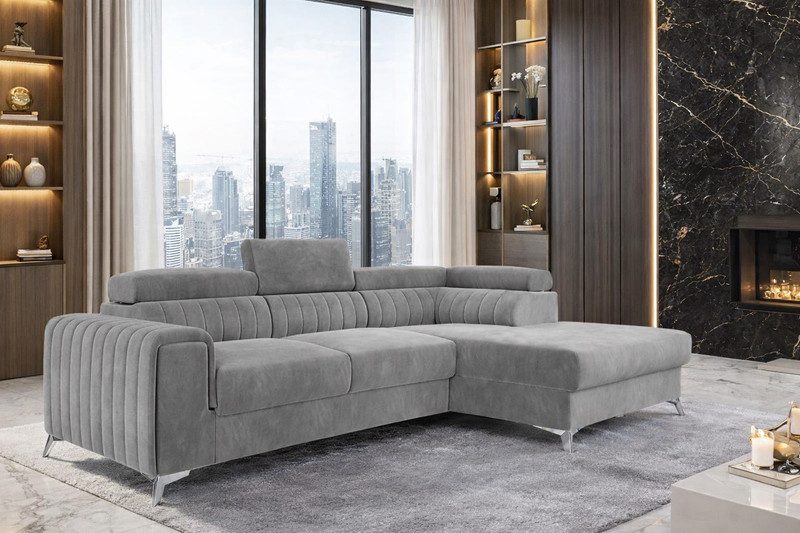 Light grey Fairhaven Mini corner sofa bed with channel-stitched back and chrome legs in a bright living room beside a large window
